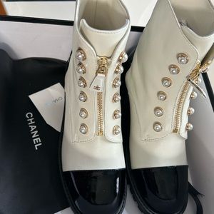 CC not authentic but cute pair of boots fits more like size 8 medium. Unworn